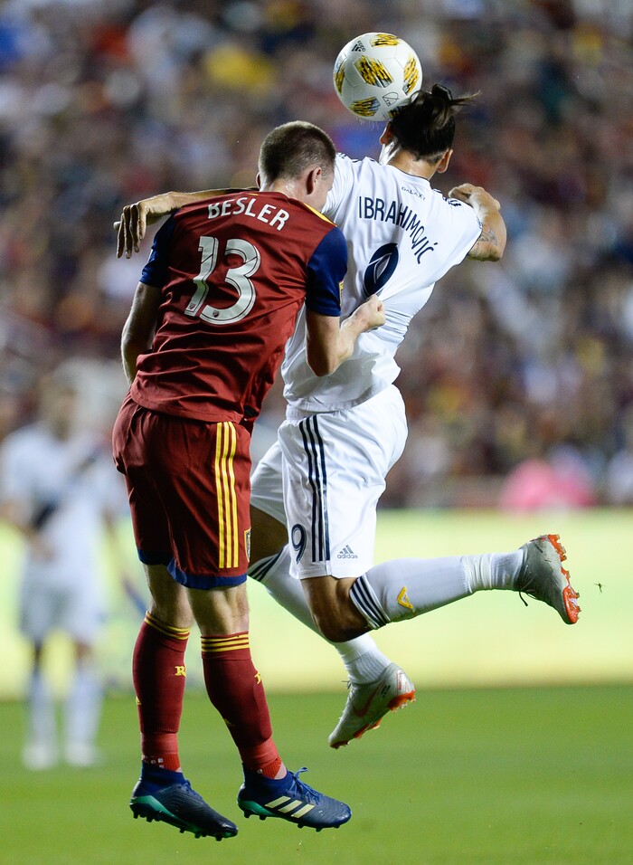(Francisco Kjolseth  |  The Salt Lake Tribune)  Real Salt Lake midfielder Nick Besler (13) battles Los Angeles Galaxy forward Zlatan Ibrahimovic (9) during the first half of the MLS soccer match Saturday, Sept. 1, 2018, in Sandy at Rio Tinto Stadium.