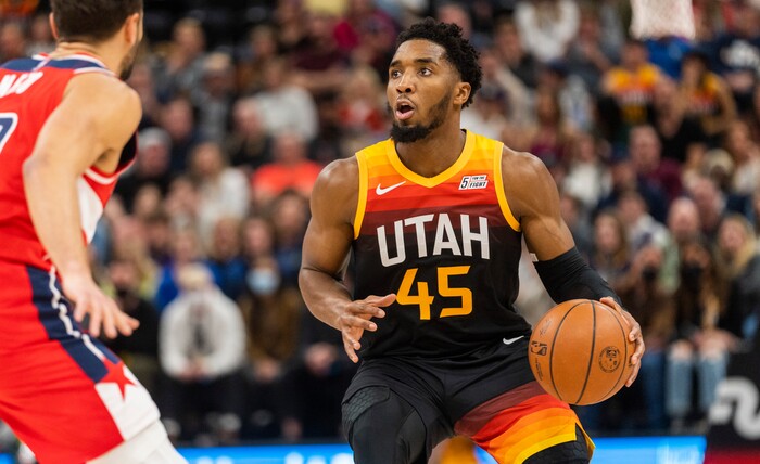 (Rick Egan | The Salt Lake Tribune) Utah Jazz guard Donovan Mitchell (45) looks for a shot, as Washington Wizards guard Raul Neto (19) defends, in NBA action between the Utah Jazz and the Washington Wizards, at Vivint Arena on Saturday, Dec. 18, 2021.