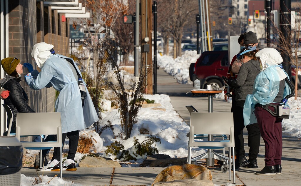 (Chris Samuels | The Salt Lake Tribune) People are tested for COVID-19 at the Salt Lake Public Health Center on 200 East and 600 South in Salt Lake City, Monday, Dec. 20, 2021.