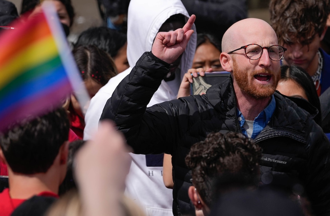(Francisco Kjolseth | The Salt Lake Tribune) Sen. Derek Kitchen joins East High school students in support of their walkout on Friday, April 15, 2022, to protest HB11, which bans transgender girls from participating in female school sports. Sen. Kitchen encouraged the students to write their representatives and vote those out who supported the legislation. 