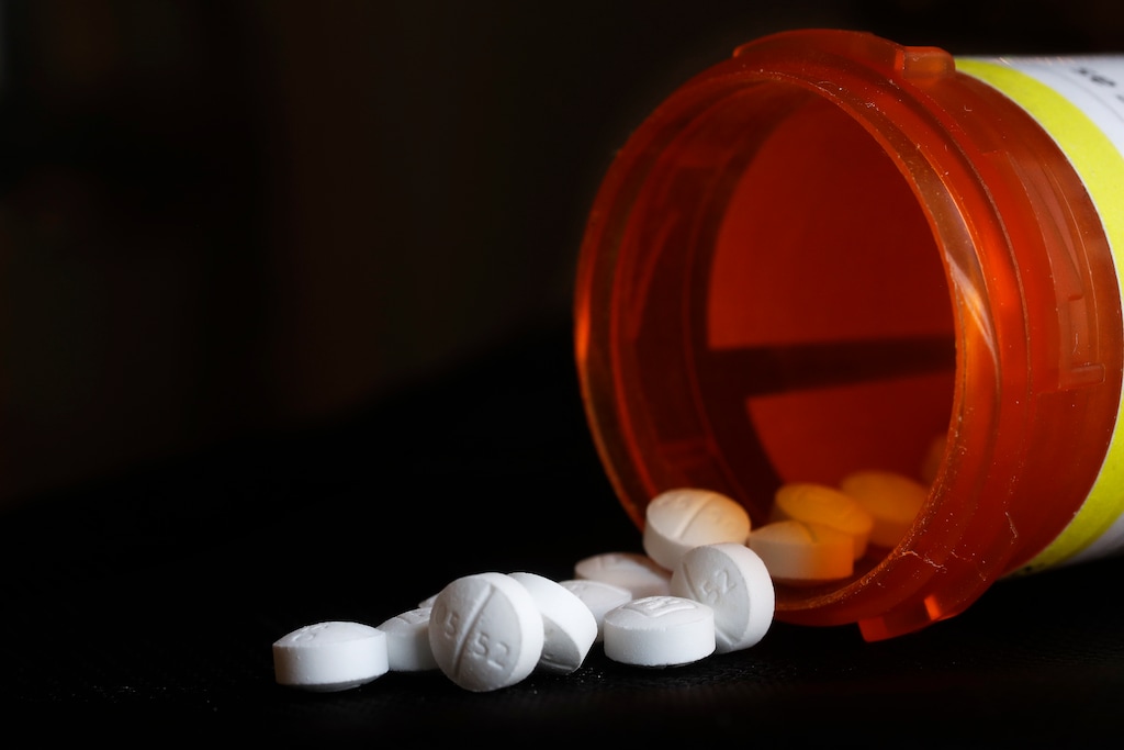 This Wednesday, Aug. 29, 2018 photo shows an arrangement of Oxycodone pills in New York. A study in Tennessee released on Thursday, Aug 30, 2018, found learning disabilities and other special education needs are more common in young children who were born with symptoms from their mothers' prenatal opioid use. The results bolster evidence of long-term consequences for infants caught in the nation's opioid epidemic. (AP Photo/Mark Lennihan)