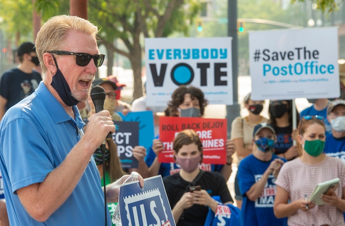 (Rick Egan  |  The Salt Lake Tribune)   Jeff Worthington, President of Utah AFL-CIO, speaks to protesters during a rally to "Save the Post Office," hosted by Alliance for a Better Utah, NAACP Salt Lake Branch, League of Women Voters at the Post Office on 200 South in Salt Lake City, Saturday, Aug. 22, 2020.