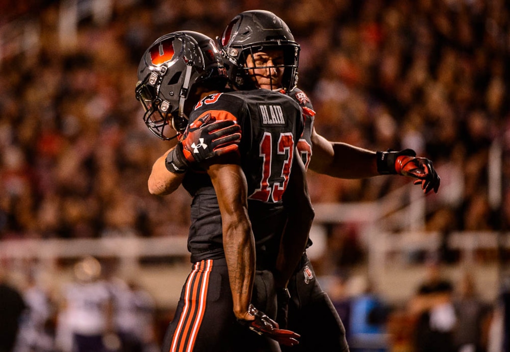 (Trent Nelson | The Salt Lake Tribune)
Utah Utes defensive back Marquise Blair (13) celebrates a hit with Utah Utes linebacker Cody Barton (30) as the University of Utah hosts Washington at Rice-Eccles Stadium in Salt Lake City, Saturday Sept. 15, 2018.