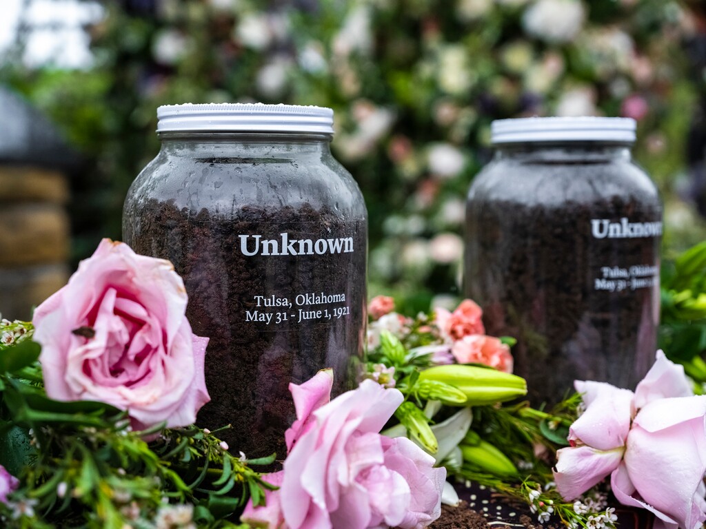 (Joshua Rashaad McFadden | The New York Times)
Jars of soil at a soil collection ceremony held by the Tulsa Community Remembrance Coalition and the Equal Justice Initiative to honor the remaining unknown victims of the 1921 Tulsa Race Massacre, on the 100th anniversary, in Tulsa, Okla., on Monday, May 31, 2021.