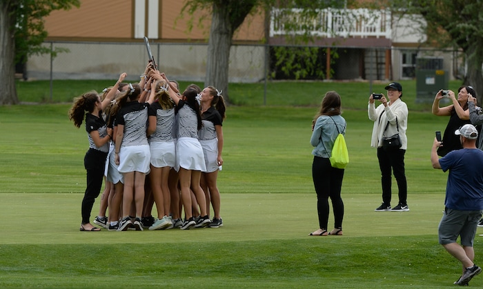 (Francisco Kjolseth  |  The Salt Lake Tribune)  Davis gathers to celebrate their 2nd place team title on day two of the Class 6A girls' golf state tournament at Meadow Brook Golf Course in Taylorsville on Tuesday, May 15, 2018.
