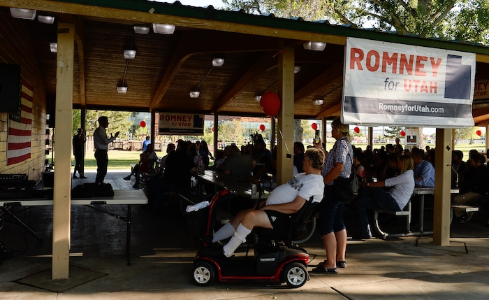 (Francisco Kjolseth | The Salt Lake Tribune) The Romney campaign hosts "Mondays With Mitt" at Veterans Memorial Park in West Jordan on Monday, June 18, 2018 as senate candidate Mitt Romney visits with supporters and takes a few questions with the dozens gathered at the park.