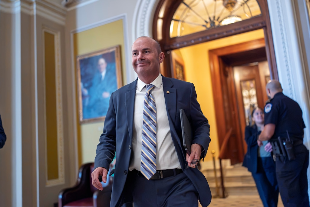 (J. Scott Applewhite | AP) Sen. Mike Lee, R-Utah, smiles as he heads to a closed-door luncheon with fellow Republicans at the Capitol in Washington, Wednesday, Sept. 30, 2026.
