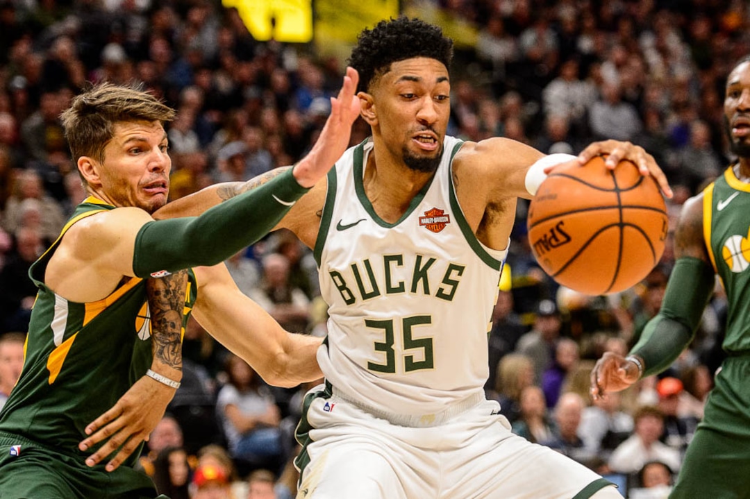 (Trent Nelson | The Salt Lake Tribune)  Utah Jazz guard Kyle Korver (26) defending Milwaukee Bucks forward Christian Wood (35) as the Utah Jazz host the Milwaukee Bucks, NBA basketball in Salt Lake City on Saturday March 2, 2019.