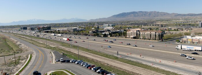 (Al Hartmann | The Salt Lake Tribune)
North frontage road and I-15 at the Thanksgiving Point exit in Lehi, one of the busiest exchanges in the state. Utah Department of Transportation’s (UDOT) I-15 Tech Corridor project in Lehi will widen I-15 with two new lanes in each direction from Lehi Main Street to S.R. 92. It will also alleviate east-west congestion in this busy area by building a bridge at Triumph Boulevard, adding a one-way frontage road system from 2100 North to S.R. 92 and reconstructing those two interchanges. In addition, the project will construct 17 bridges and include several bike and pedestrian improvements.