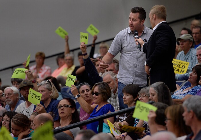(Scott Sommerdorf   |  The Salt Lake Tribune)   
Brandon Russell asks Congressman Rob Bishop a question about a possible government shutdown during his town hall meeting held at Layton Christian Academy in Layton, Utah, Friday, August 25, 2017. Bishop answered that he did not believe that a shutdown is a good idea.