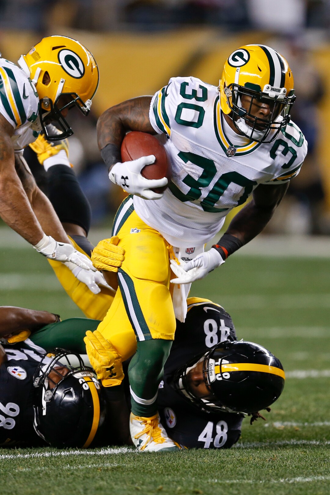 Green Bay Packers running back Jamaal Williams (30) plays in an NFL football game against the Pittsburgh Steelers, Sunday, Nov. 26, 2017, in Pittsburgh. (AP Photo/Keith Srakocic)