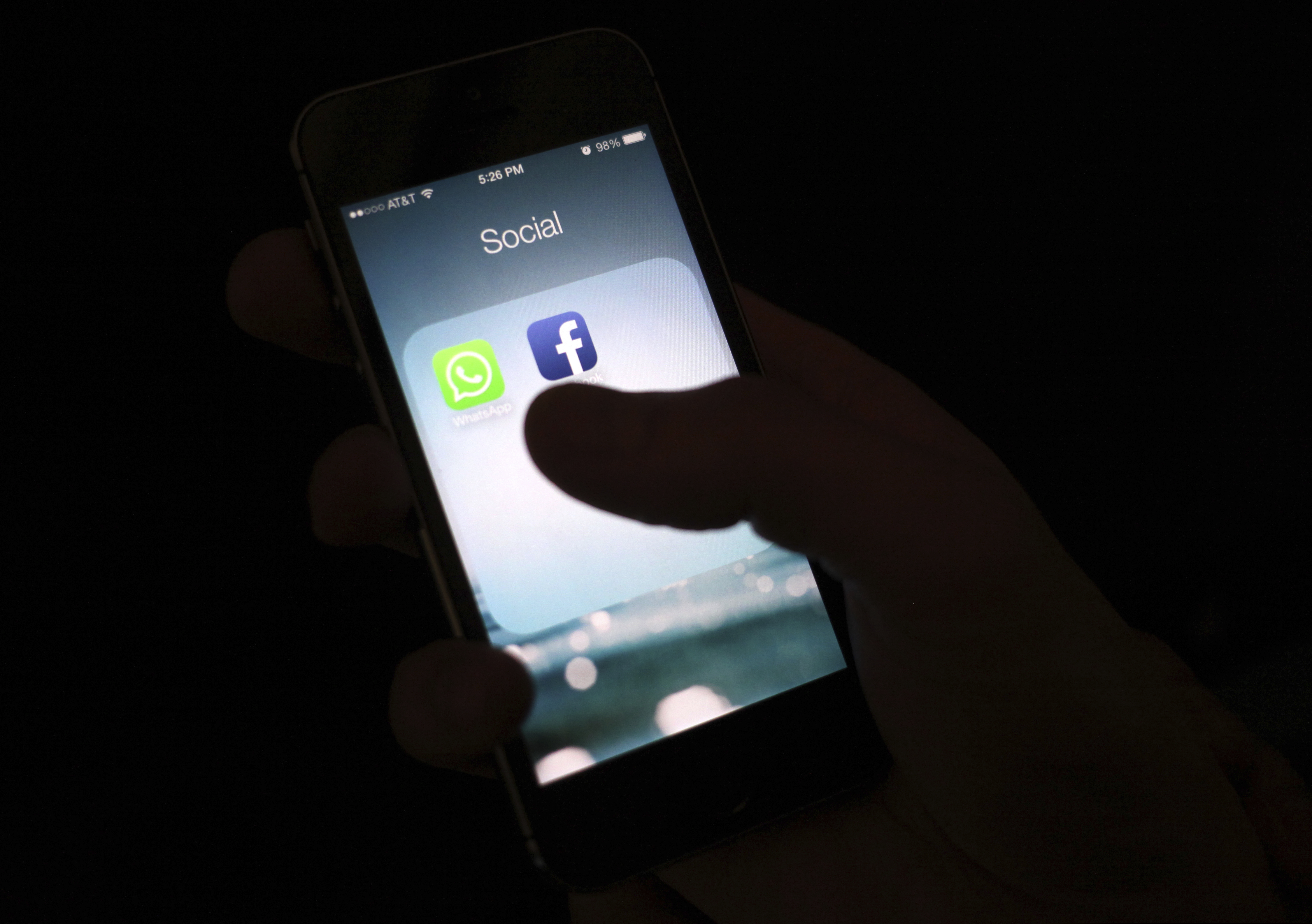 (Karly Domb Sadof | AP file photo) This Feb. 19, 2014, file photo shows the Facebook app icon on an iPhone in New York. The Wall Street Journal is reporting that several phone apps are sending sensitive user data to Facebook, including health information, without users’ consent. The report says an analytics tool called “App Events” allows app developers to record user activity and report it back to Facebook, even if the user isn’t on Facebook.
