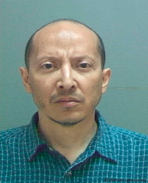 (Salt Lake County Sheriff's Office, via AP)  In this photograph provided by Salt Lake County Sheriff's Office, shows Paul Gutierrez Marquez. Marquez, a Utah man has been arrested on suspicion of kidnapping after police say he held six missionaries from The Church of Jesus Christ of Latter-day Saints at gunpoint in his home. Charging documents say Marquez invited the men over to his home Thursday, June 20, 2019, night in West Valley City to talk about religion. Marquez pointed a gun at them when they talked about things he didn't like.