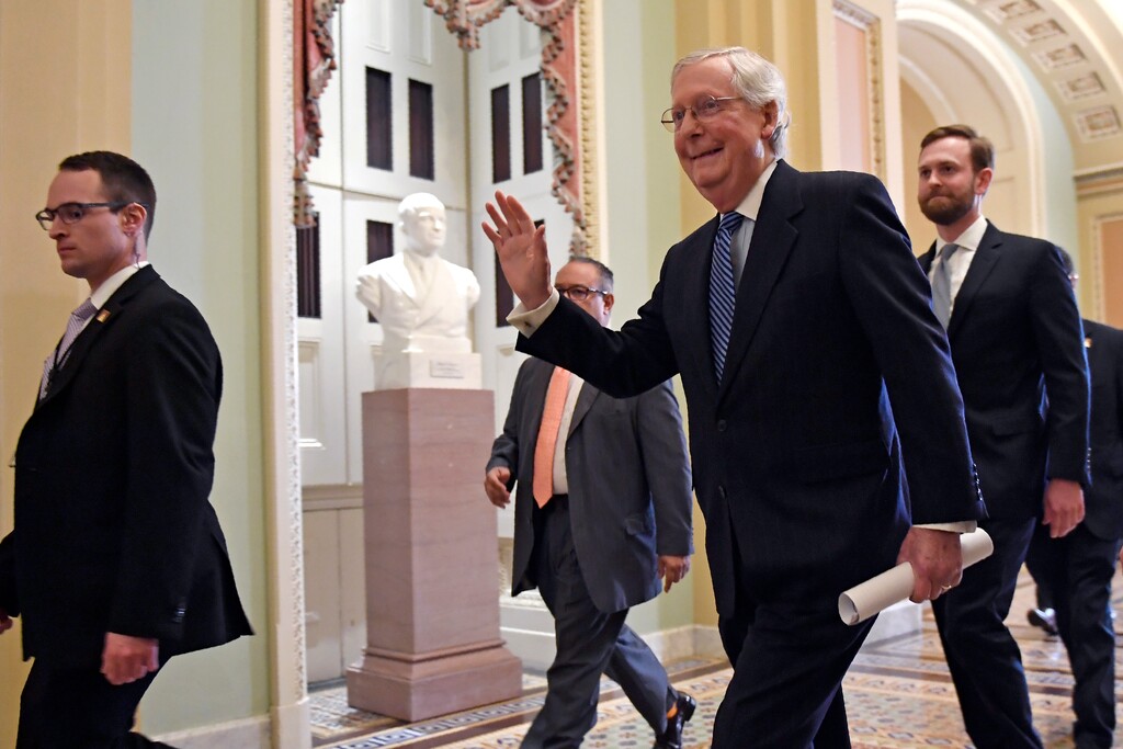 (Susan Walsh | AP) Senate Majority Leader Mitch McConnell of Ky., walks on Capitol Hill in Washington, Wednesday, Feb. 5, 2020, following a vote in the Senate to acquit President Donald Trump on both articles of impeachment.