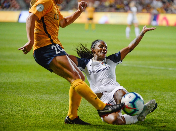 (Francisco Kjolseth  |  The Salt Lake Tribune)  Utah Royals FC forward Mallory Weber (20) gets her shot blocked by North Carolina Courage forward Crystal Dunn (19) as Utah Royals FC hosts the North Carolina Courage at Rio Tinto Stadium in Sandy, Utah on Saturday, July 27, 2019.