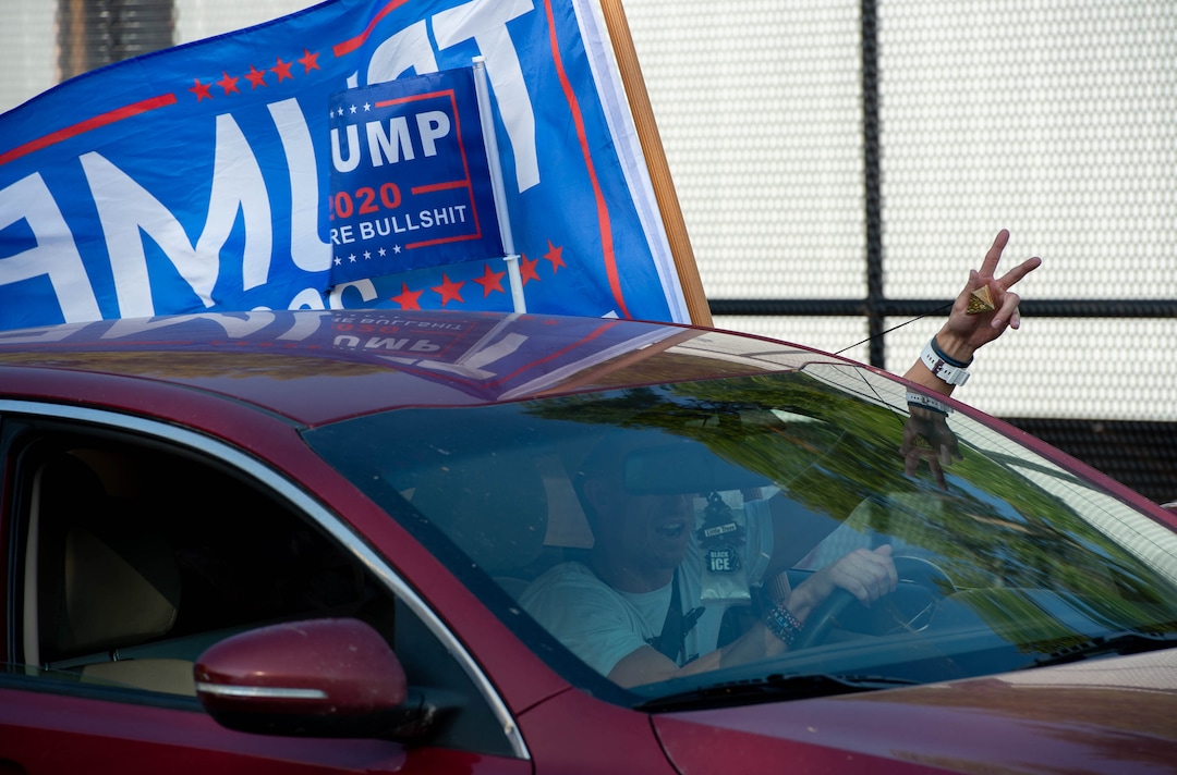 (Francisco Kjolseth  |  The Salt Lake Tribune) Supporters of President Donald Trump rally outside of Kingsbury Hall on the University of Utah campus in Salt Lake City on Wednesday, Oct. 7, 2020, before the vice presidential debate.
