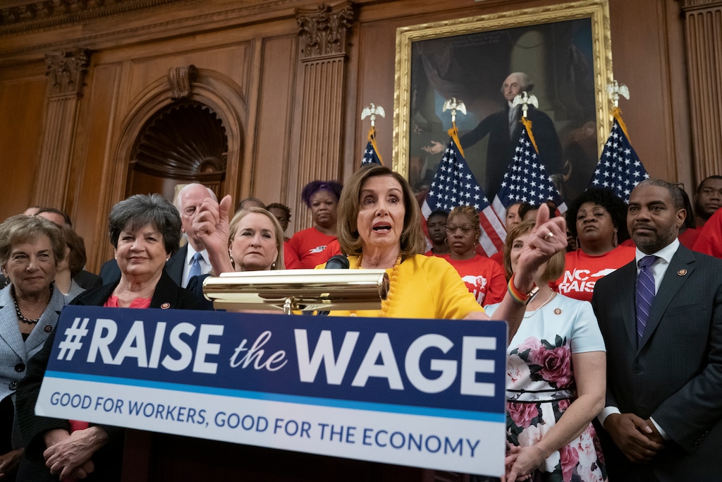 (J. Scott Applewhite | AP file photo) In this July 18, 2019, file photo speaker of the House Nancy Pelosi, D-Calif., joins fellow Democrats and activists seeking better pay as the House approved legislation to raise the federal minimum wage for the first time in a decade _ to $15 an hour, at the Capitol in Washington. As of Jan. 1, 2020, there are higher minimum wages in a quarter of the states, and new federal overtime rules.