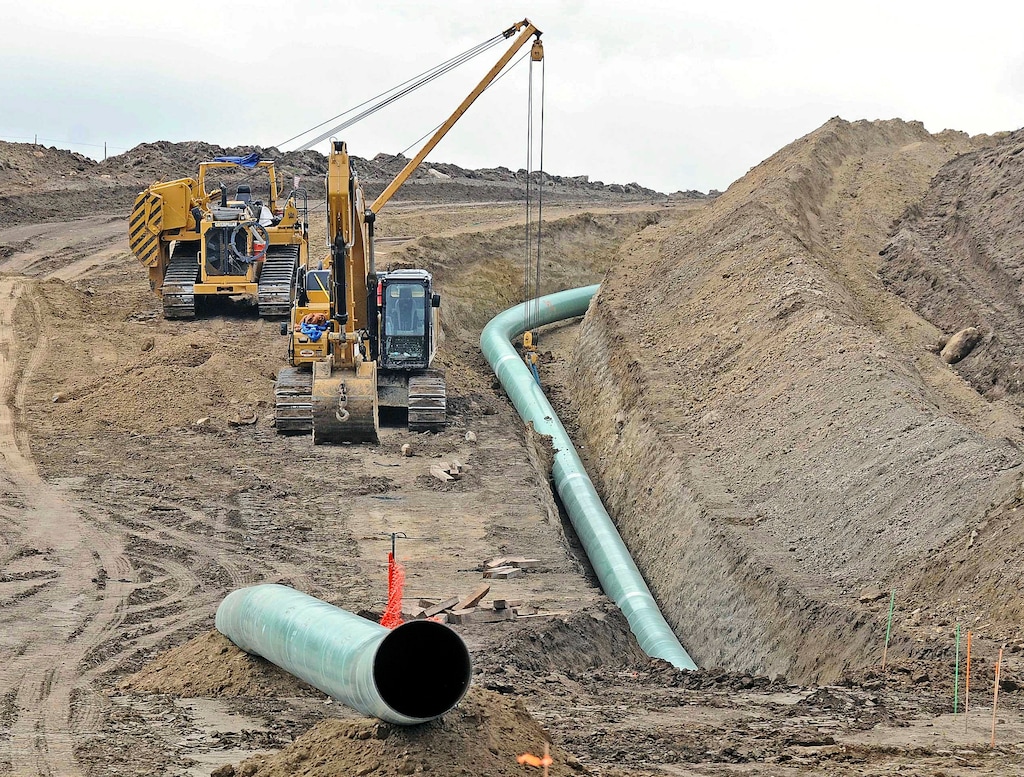 (Tom Stromme | The Bismarck Tribune via AP, file) In this Oct. 5, 2016, file photo, heavy equipment is seen at a site where sections of the Dakota Access pipeline were being buried near the town of St. Anthony in Morton County, N.D. A federal judge on Monday, July 6, 2020, sided with the Standing Rock Sioux Tribe and ordered the Dakota Access pipeline to shut down until more environmental review is done.