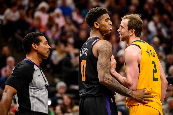 (Trent Nelson | The Salt Lake Tribune)  Utah Jazz forward Joe Ingles (2) tries to calm Phoenix Suns forward Marquese Chriss (0) as the Utah Jazz host the Phoenix Suns, NBA basketball in Salt Lake City, Wednesday Feb. 14, 2018.