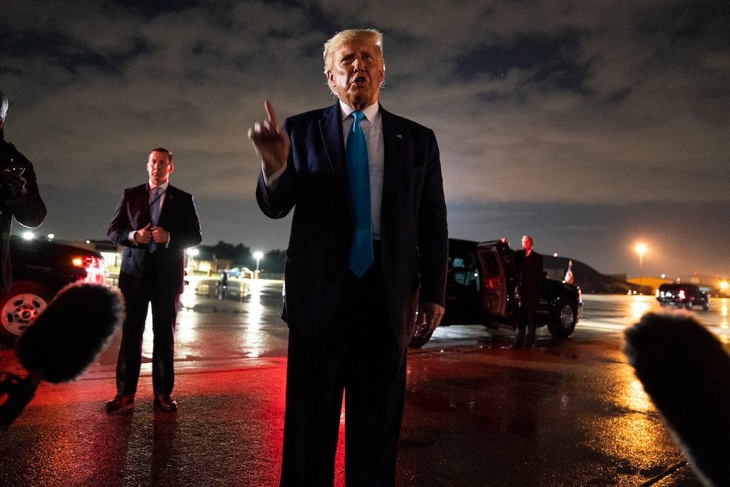 President Donald Trump talks with reporters at Andrews Air Force Base after attending a campaign rally in Latrobe, Pa., Thursday, Sept. 3, 2020, at Andrews Air Force Base, Md. (AP Photo/Evan Vucci)