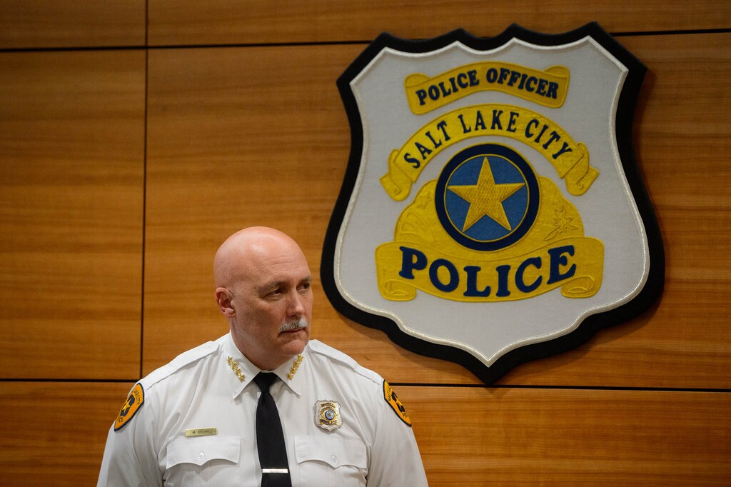 (Trent Nelson  |  The Salt Lake Tribune) Salt Lake City police chief Mike Brown listens as mayor Erin Mendenhall speaks at a news conference on the release of video showing another police shooting in Salt Lake City,  on Monday, Sept. 21, 2020.