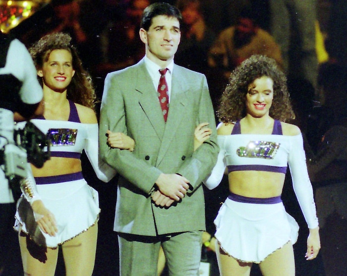 (Steve Griffin  | Tribune File Photo)  John Stockton is escorted onto the court by two Jazz dancers,  during the 1993 All Star festivities, in the Delta Center in Salt Lake City, Saturday, Feb. 20, 1993.
