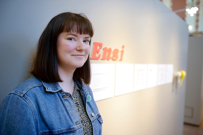 (Chris Samuels | The Salt Lake Tribune) Hannah Lutz poses for a photo with her exhibit Ensi, a redesign of a menstrual hygiene product dispenser, at a showcase for Utah Design Arts at the Rio Grande Depot in Salt Lake City, Sept. 12, 2019.