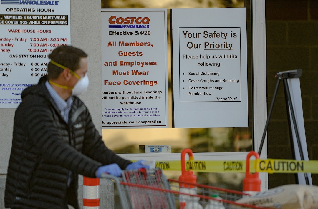 (Francisco Kjolseth  |  The Salt Lake Tribune) Costco begins implementing a policy on Monday, May 4, 2020, that everyone in the store, including shoppers, have to wear a mask, as people shop early in Salt Lake City during the coronavirus pandemic.