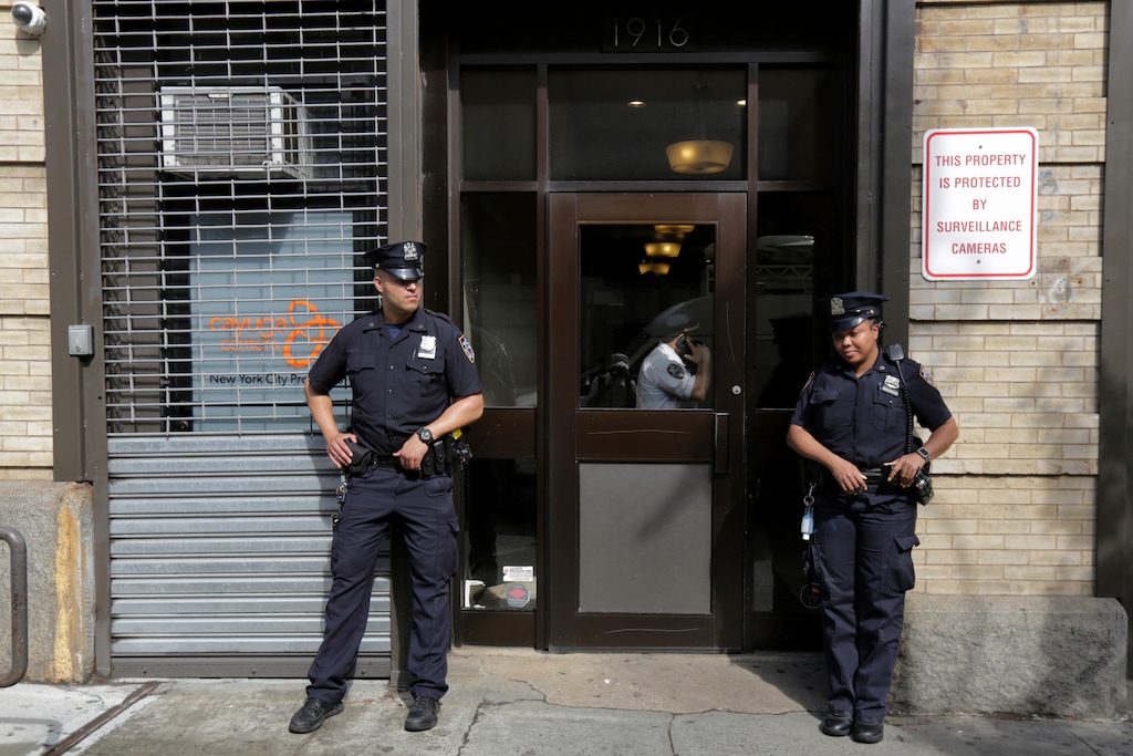 (Richard Drew | AP Photo) In this Thursday, June 21, 2018 file photo, police stand outside an office for the Cayuga Centers in the Brooklyn borough of New York. Three of the four incidents involving physical harm to separated immigrant children, outlined in legal filings, involved charges of Cayuga Centers, the largest foster care placement for migrant children.
