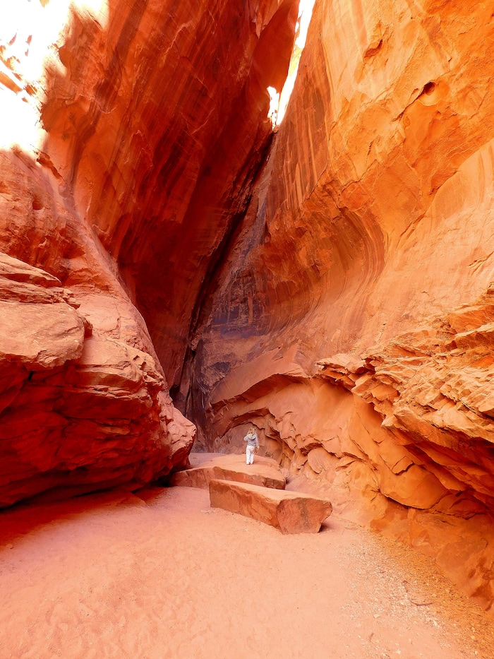 Erin Alberty  |  The Salt Lake TribuneA young hiker hops the rocks in Singing Canyon, a roadside slot in Grand Staircase-Escalante National Monument..