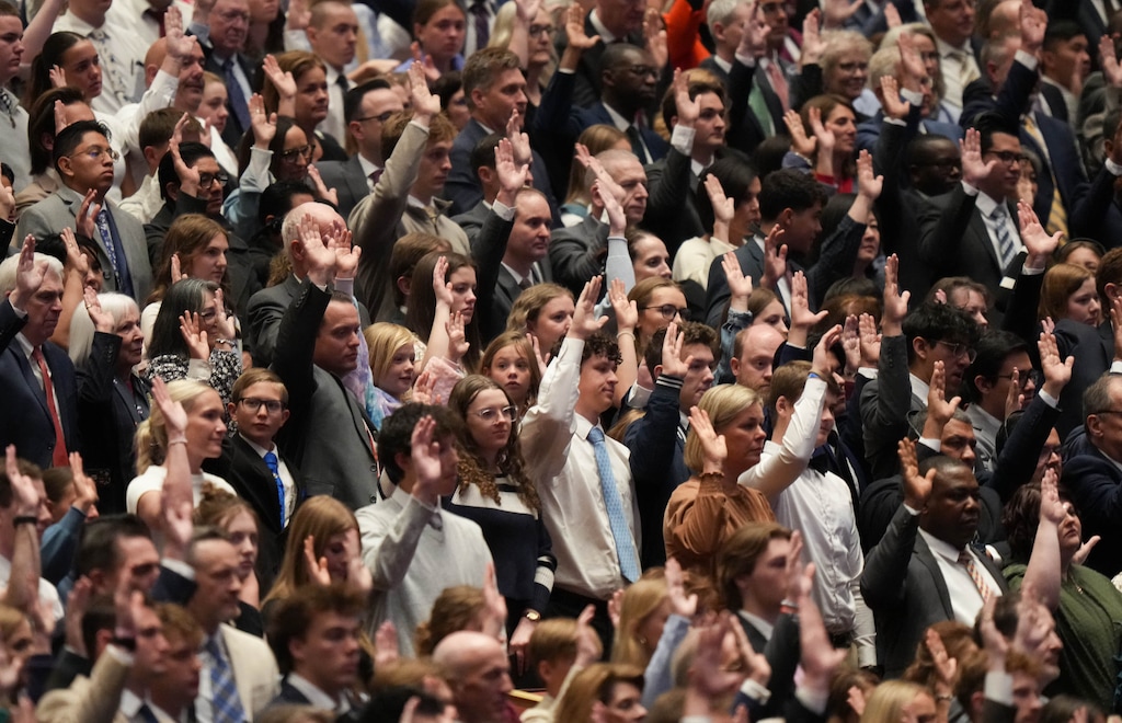 (Francisco Kjolseth | The Salt Lake Tribune) Members stand to sustain President Dallin H. Oaks and the First Presidency during a solemn assembly on April 4, 2026.