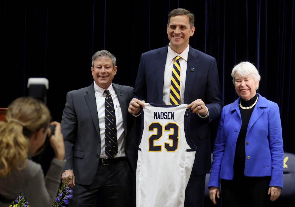 (Jane Tyska | Bay Area News Group via AP)Bay Area News Group via AP) California men's NCAA college basketball coach Mark Madsen, center, poses with director of athletics Jim Knowlton, left, and Chancellor Carol T. Christ, right, during a news conference at Haas Pavilion in Berkeley, Calif., Monday, April 3, 2023.