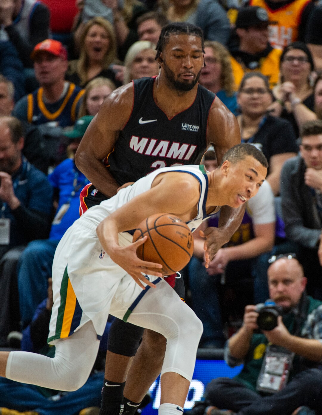 (Rick Egan  |  The Salt Lake Tribune)     Utah Jazz guard Dante Exum (11) drives with the ball, as Miami Heat forward Justise Winslow (20) defends, in NBA action between Utah Jazz and Miami Heat, at Viint Smart Home Arena Wednesday, Dec. 12, 2018.