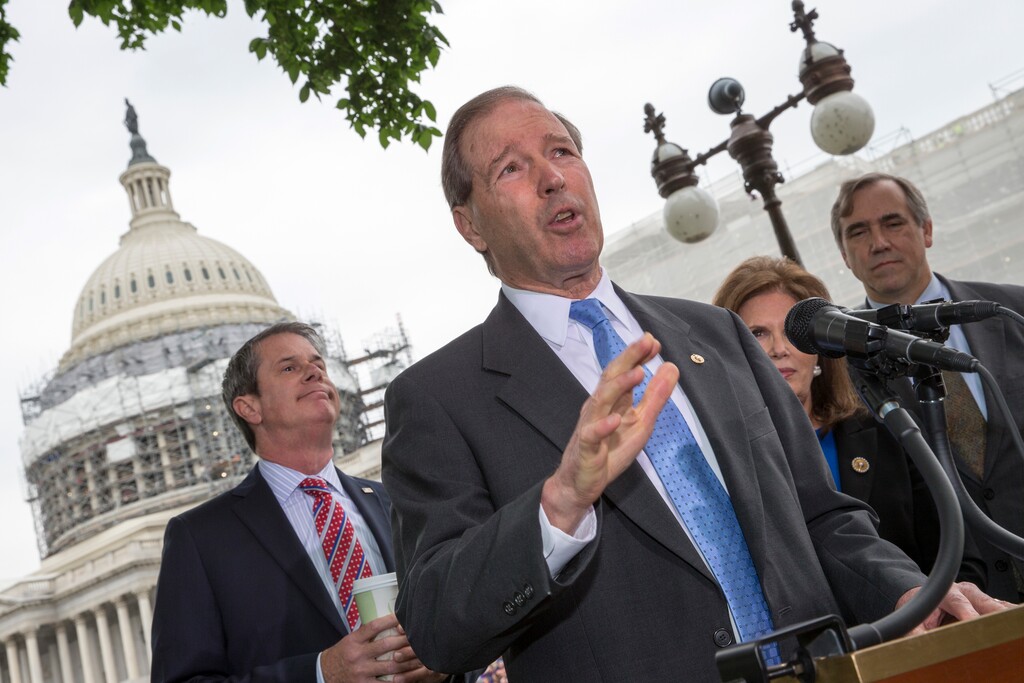 Sen. Tom Udall, D-N.M., joined by, from left, Sen. David Vitter, R-La., Bonnie Lautenberg, widow of the late New Jersey Sen. Frank Lautenberg, and Sen. Jeff Merkley, D-Ore., talks about bipartisan legislation to improve the federal regulation of chemicals and toxic substances, Thursday, May 19, 2016, during a news conference on Capitol Hill in Washington. Sen. Udall is the sponsor of the bill which was initiated by Sen. Frank Lautenberg. (AP Photo/J. Scott Applewhite)