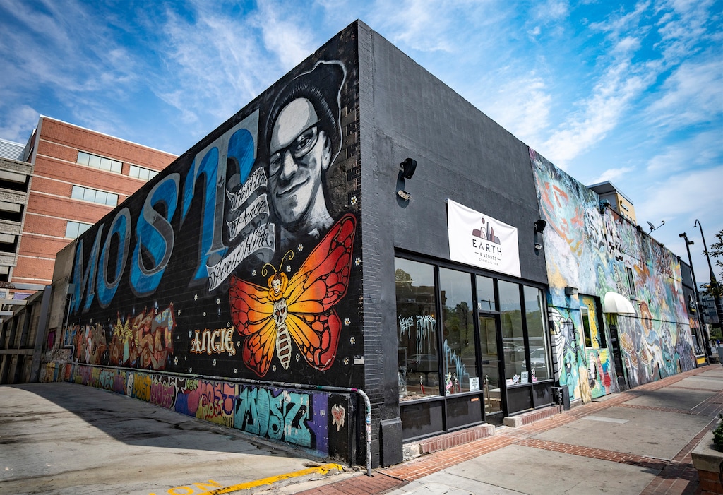 (Rick Egan | The Salt Lake Tribune)  Earth and Stones Cocktail Bar at 63 Exchange Place, on Thursday, Aug. 8, 2024. The mural on the side of the building — a memorial to Joey and Angie Kirk, the deceased wife and son of Heavy Metal Shop owner Kevin Kirk, whose store used to be on the site — will remain, the bar owners said.