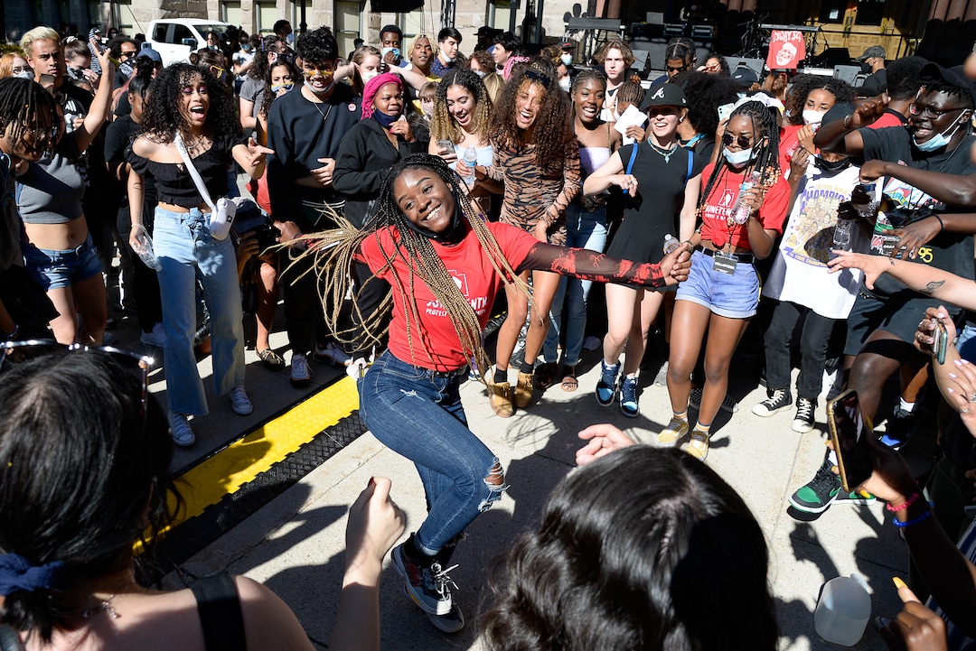 (Francisco Kjolseth  |  The Salt Lake Tribune) Diane Bahati, center, joins revelers dancing during the Juneteenth celebration at Washington Square in Salt Lake City on Friday, June 19, 2020.