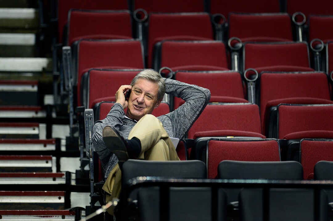 (Scott Sommerdorf  |  Tribune File Photo)  Utah Athletic Director, Dr. Chris Hill speaks on his phone as the Utes practice at the Moda Center in Portland, Wednesday, March 18, 2015. 