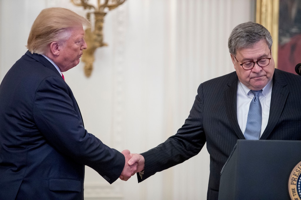 (Andrew Harnik | AP file photo) President Donald Trump, left, shakes hands with Attorney General William Barr on Sept. 9, 2019.