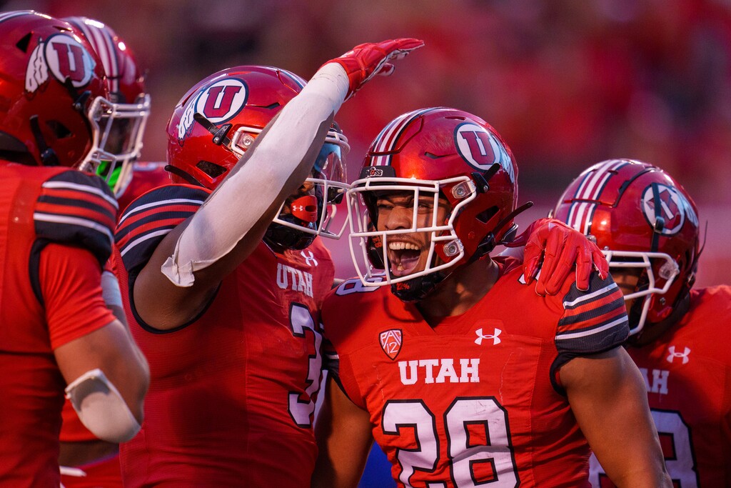(Trent Nelson | The Salt Lake Tribune) Utah Utes safety Sione Vaki (28) celebrates an interception as the Utah Utes host the Florida Gators, NCAA football in Salt Lake City on Aug. 31, 2023. Vaki is one of 28 Californians on the Utes' roster this season. But with the program's move to the Big 12, how and where Utah recruits is changing.