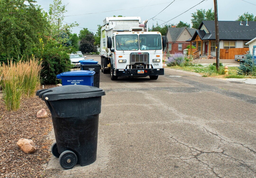 (Rick Egan  |  The Salt Lake Tribune)  A recycling truck collects recycled material in Sugarhouse for the Wasatch Front Waste and Recycling District on Friday, July 26, 2019.