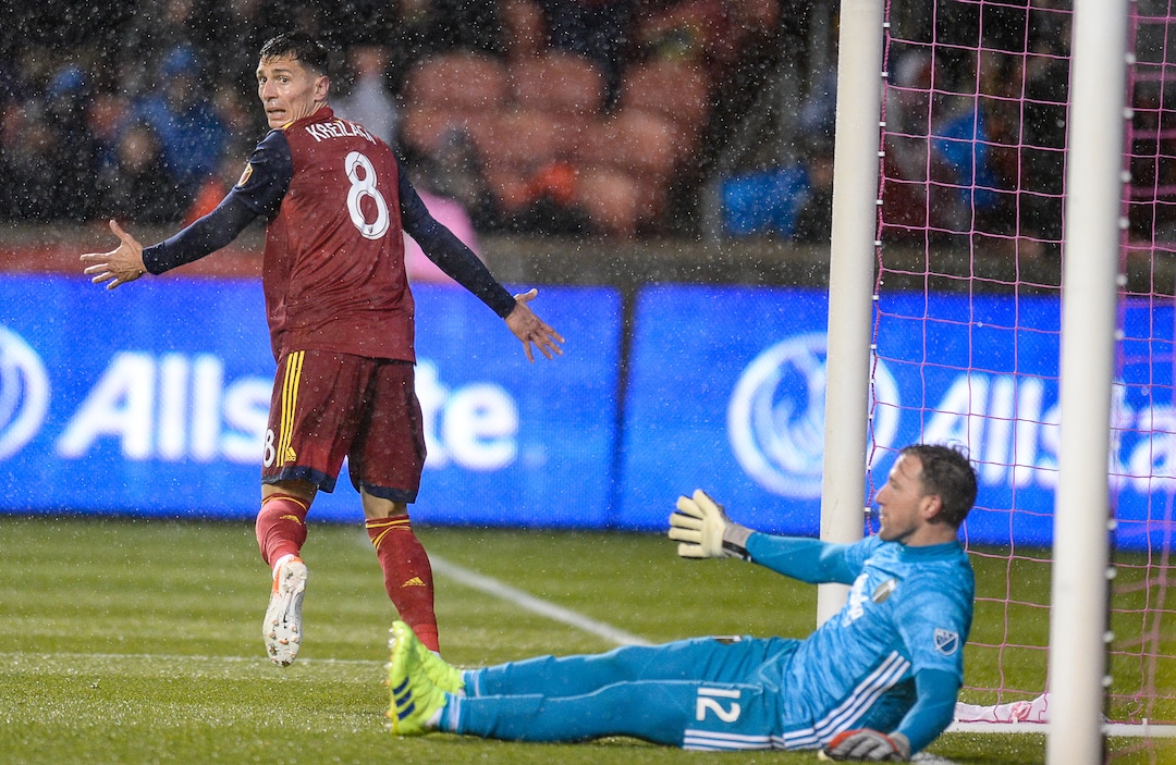 (Francisco Kjolseth  |  The Salt Lake Tribune)  Real Salt Lake midfielder Damir Kreilach (8) celebrates his goal over Portland Timbers goalkeeper Steve Clark (12) in the first half as Real Salt Lake and the Portland Timbers play in their first MLS playoff game at Rio Tinto Stadium in Sandy, Utah on Saturday, Oct. 19, 2019.