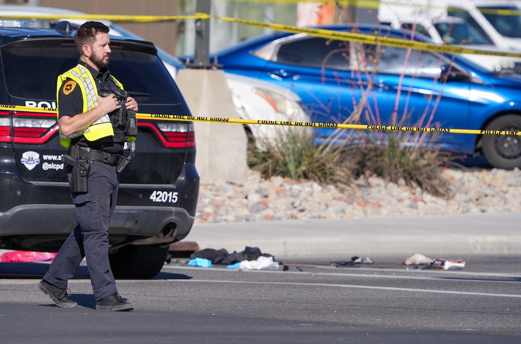 (Chris Samuels | The Salt Lake Tribune) Law enforcement respond after Salt Lake City Police say an officer shot and killed a man on the corner of 300 West and 2100 South, Wednesday, Oct. 29, 2025.