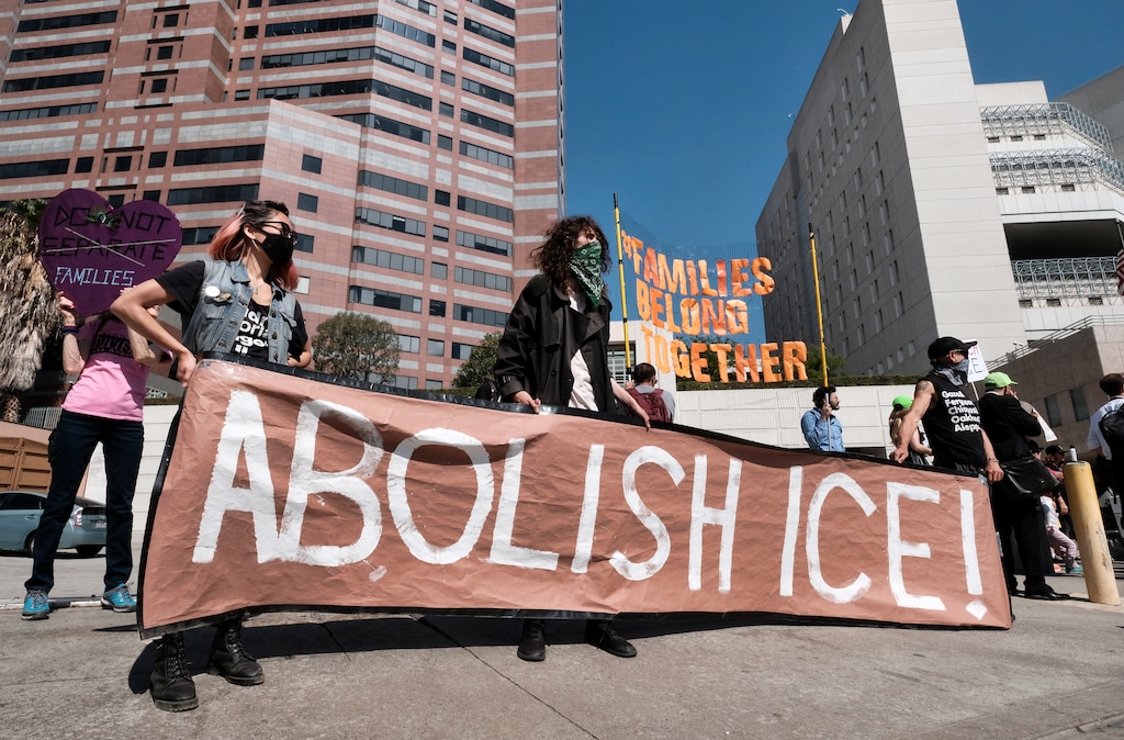 FILE - In this July 2, 2018, photo, protesters display a sign that reads "Abolish ICE" during a rally in front of the Immigration and Customs Enforcement facility in downtown Los Angeles. U.S. Immigration and Customs Enforcement is the face of President Donald Trump’s hard-line immigration policy. But agency officials say their mandate is misunderstood. Government data shows ICE is mostly targeting criminals, but also that the agency has greatly ramped up overall arrests and increased the number of people arrested solely on immigration violations. And the most frequent criminal conviction was for drunken driving. (AP Photo/Richard Vogel, File)