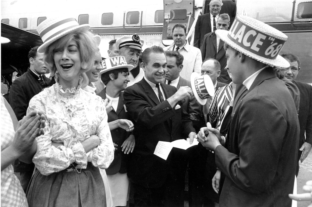 FILE - In this June 28,1968 file photo, presidential candidate, former Alabama Gov, George Wallace arrives in Boston. If President Donald Trump making racism a cornerstone of his reeleciton campaign sounds familiar, that’s because another presidential candidate did the same half a century ago. And George Wallace saw the strategy resonate with many. Wallace was elected governor of Alabama in 1962 and declared, “Segregation now. Segregation tomorrow. Segregation forever.” (AP Photo, File)