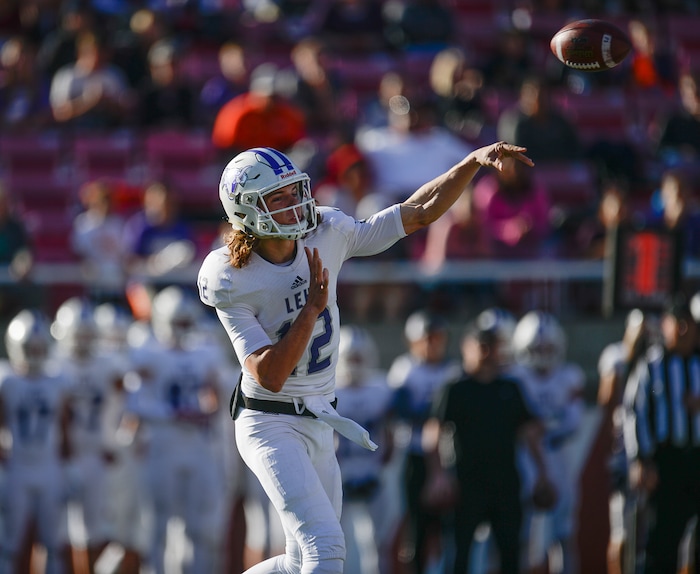 (Francisco Kjolseth | The Salt Lake Tribune) Lehi quarterback Cammon Cooper finds his mark as Springville faces Lehi in their class 5A state semifinal game at Rice-Eccles Stadium, Thursday, Nov. 9, 2017.