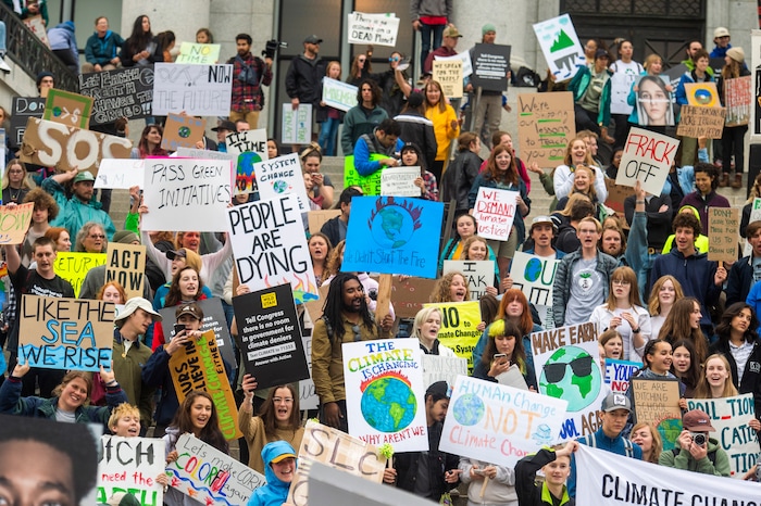 (Rick Egan  |  The Salt Lake Tribune)      Hundreds of students from around the state chant and sing as they gather on the steps of the Utah State Capitol Building, demanding action on the climate crisis. Friday, Sept. 20, 2019.