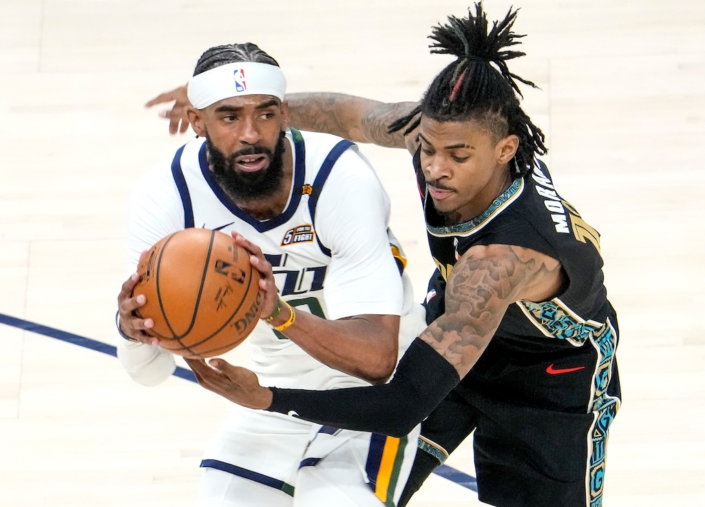 (Leah Hogsten | The Salt Lake Tribune)  Utah Jazz guard Mike Conley (10) is pressured by Memphis Grizzlies guard Ja Morant (12) as the Utah Jazz take on the Memphis Grizzlies during Game 1 of the first-round playoffs at Vivint Arena, May 23, 2021. 