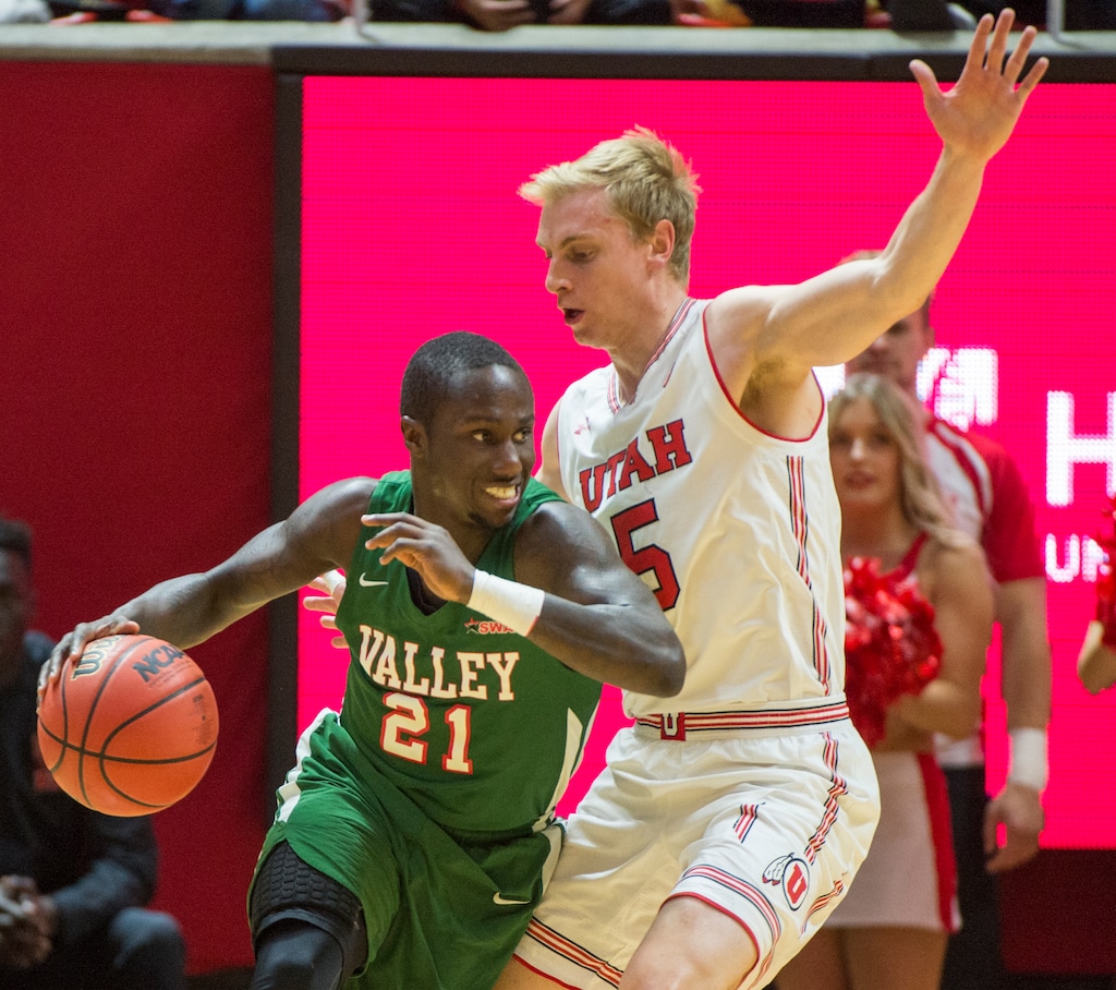 (Rick Egan  |  The Salt Lake Tribune)    Mississippi Valley State Delta Devils guard Patrick Rucker (21) tries to get past Utah Utes guard Parker Van Dyke (5), in basketball action between the Utah Utes and Mississippi Valley State Delta Devils at the Jon M. Huntsman Center, Thursday, Nov. 15, 2018.