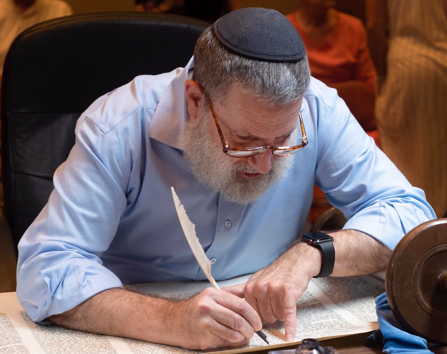 (Michael Stack | Special to The Tribune) Rabbi Moshe Druin, a sofer, or Jewish text expert, restores the Torah using a turkey feather quill at Congregation Kol Ami in Salt Lake City, Monday, July, 18, 2022.