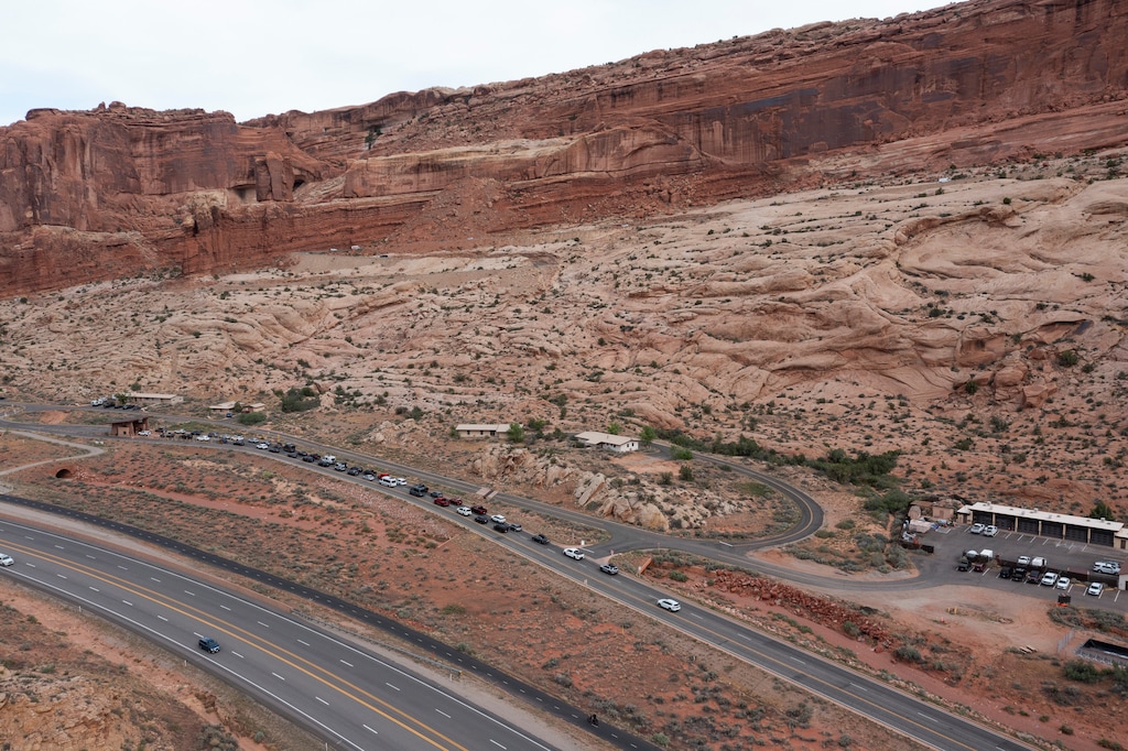 (Bethany Baker  |  The Salt Lake Tribune) Motorists line up to enter Arches National Park near Moab on Friday, April 10, 2026.